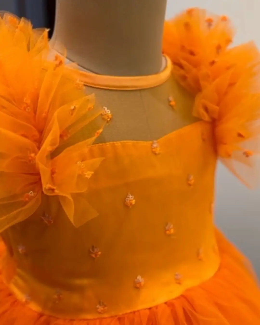 kids-clothing-kuwait-orange-tulle-dress-with-ruffled-sleevess